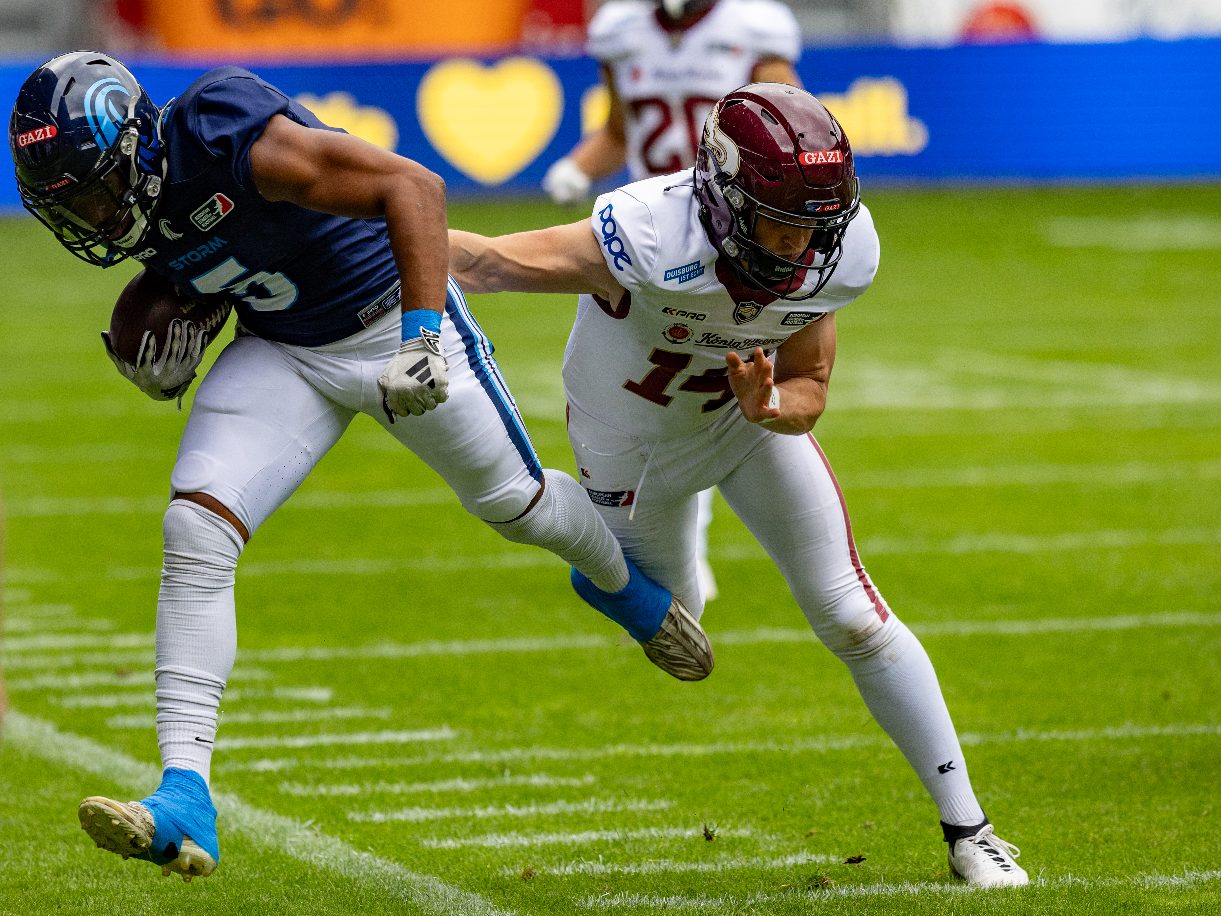#14 Maximilian Eisenhut (Punter) Rhein Fire tackle out the field #5 Edvin Taborda (WR) Nordic Storm Rhein Fire vs Nordic Storm, American Football, European League of Football, Week 14, 2025, 17.08.2025,