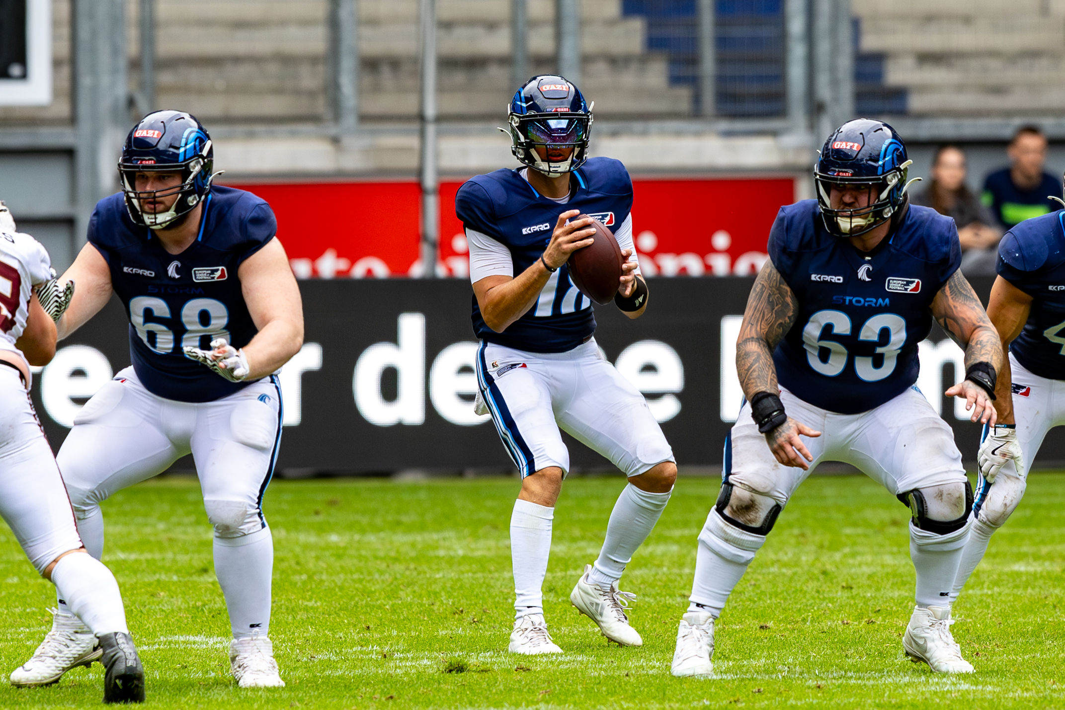 #18 Jadrian Clark (QB) Nordic Storm, #68 Love Larsson (OG) Nordic Storm and #63 Mikkel Hansen (C) Nordic Storm Rhein Fire vs Nordic Storm, American Football, European League of Football, Week 14, 2025, 17.08.2025,