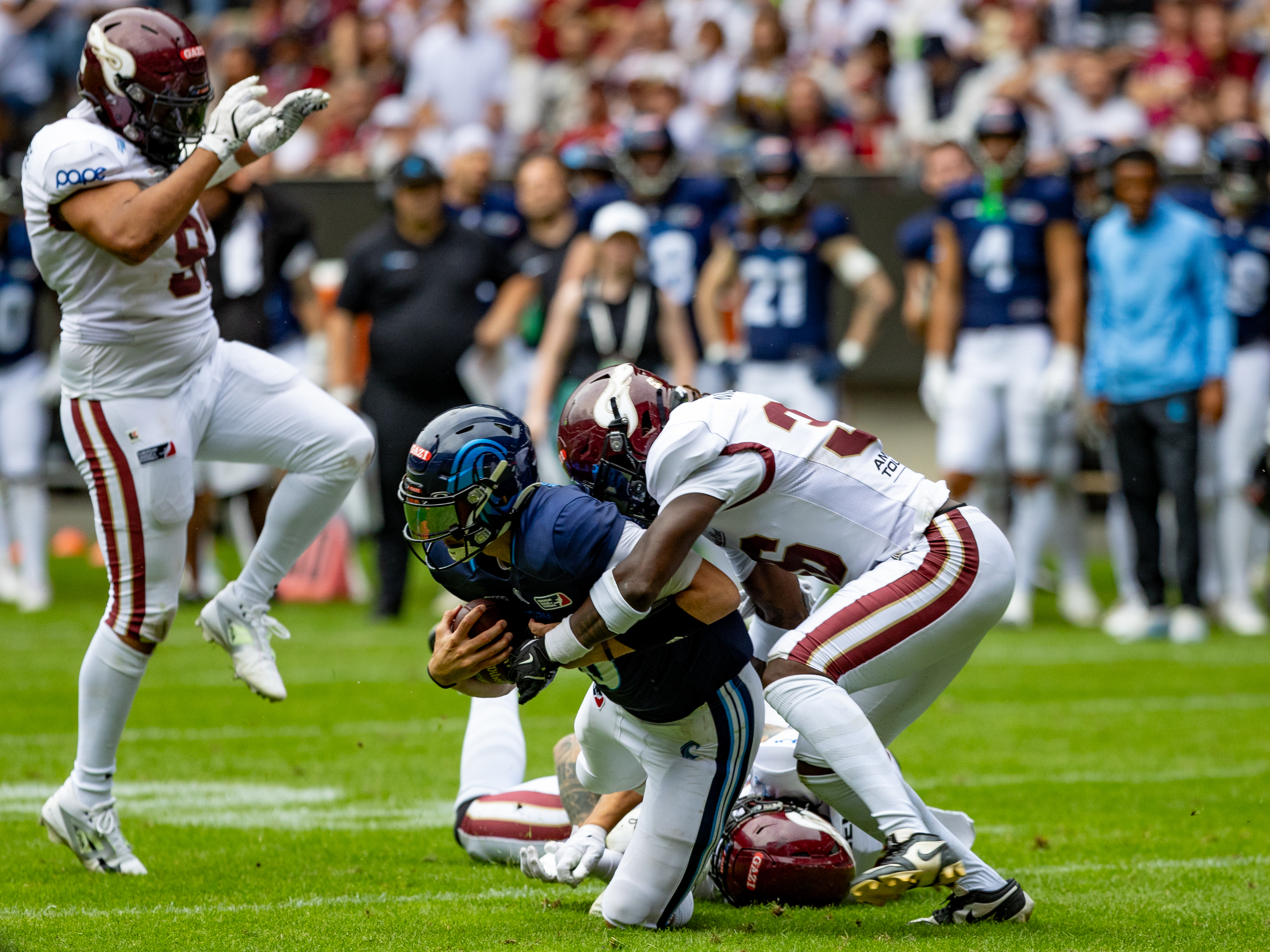 #36 Chauncey Moore (SS) Rhein Fire tackle #18 Jadrian Clark (QB) Nordic Storm Rhein Fire vs Nordic Storm, American Football, European League of Football, Week 14, 2025, 17.08.2025,