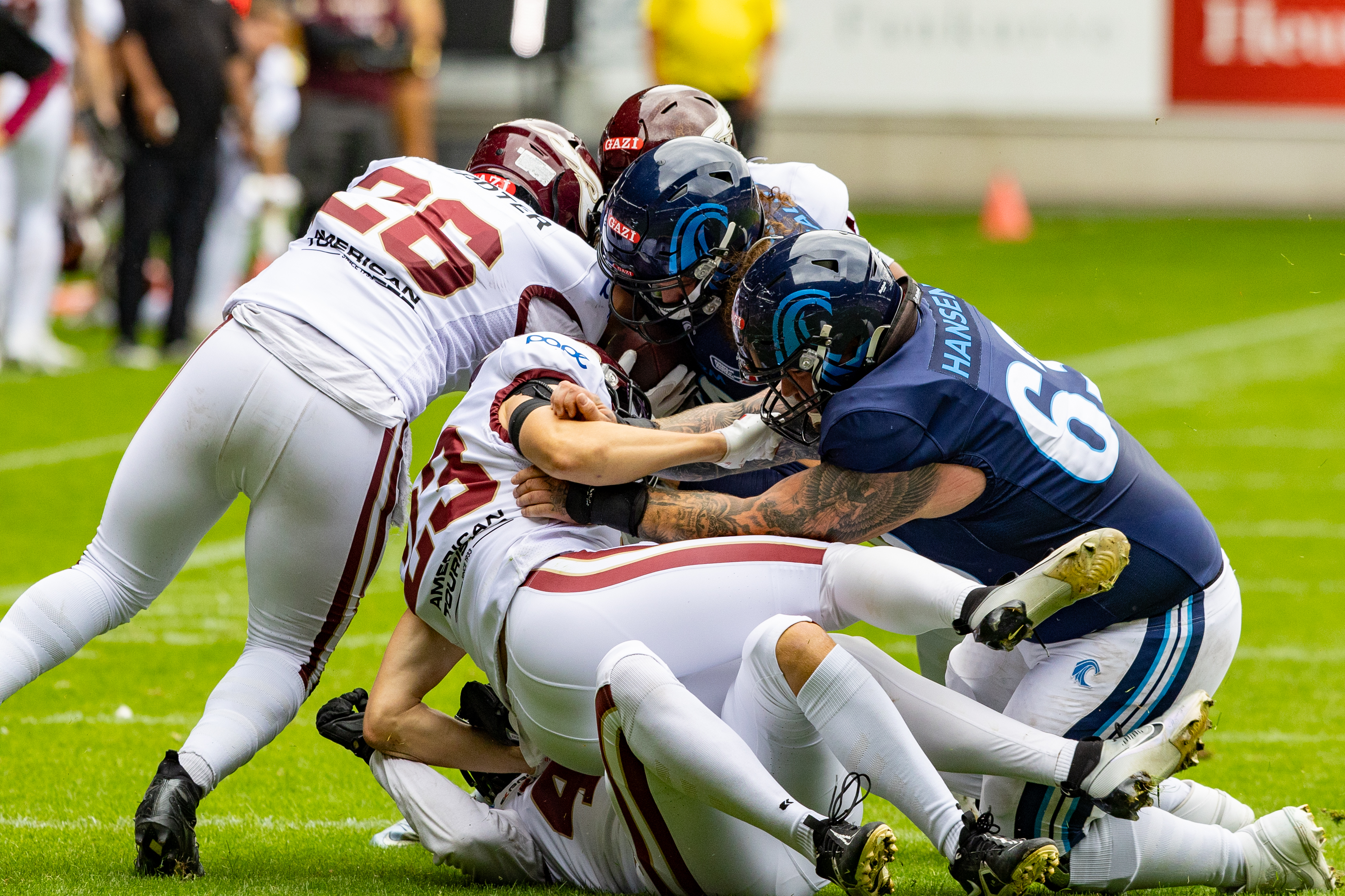 #26 Lino Schroeter (Schröter) (LB) Rhein Fire, #23 Vincent Bujalla (CB) Rhein Fire and #68 Love Larsson (OG) Nordic Storm and #19 Brendan Beaulieu (WR) Nordic Storm Rhein Fire vs Nordic Storm, American Football, European League of Football, Week 14, 2025, 17.08.2025,