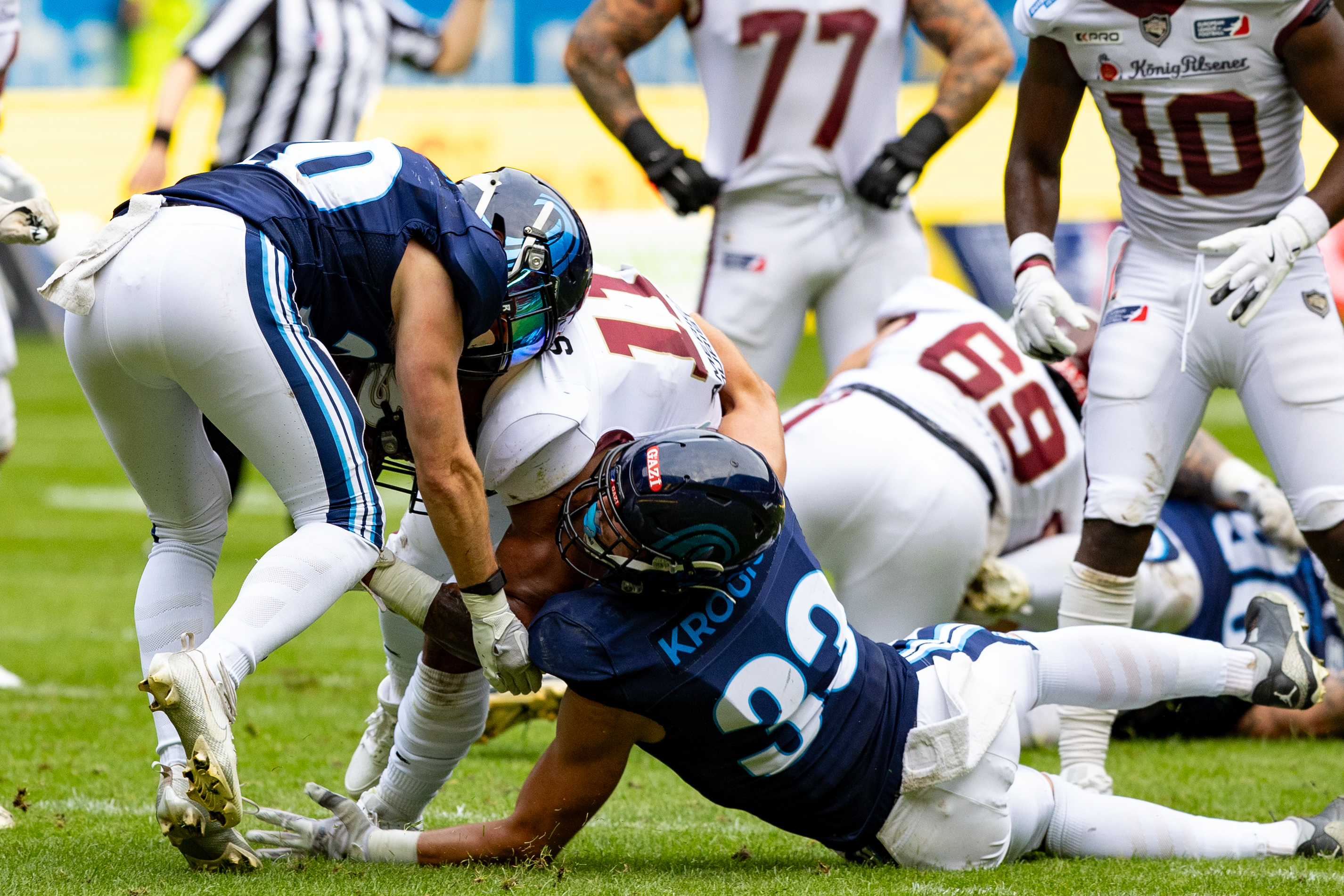 #20 Kenneth Larsen (FS) Nordic Storm and #33 Elliot Krogius (CB) Nordic Storm tackle #11 Jonathan Scott (RB) Rhein Fire Rhein Fire vs Nordic Storm, American Football, European League of Football, Week 14, 2025, 17.08.2025,