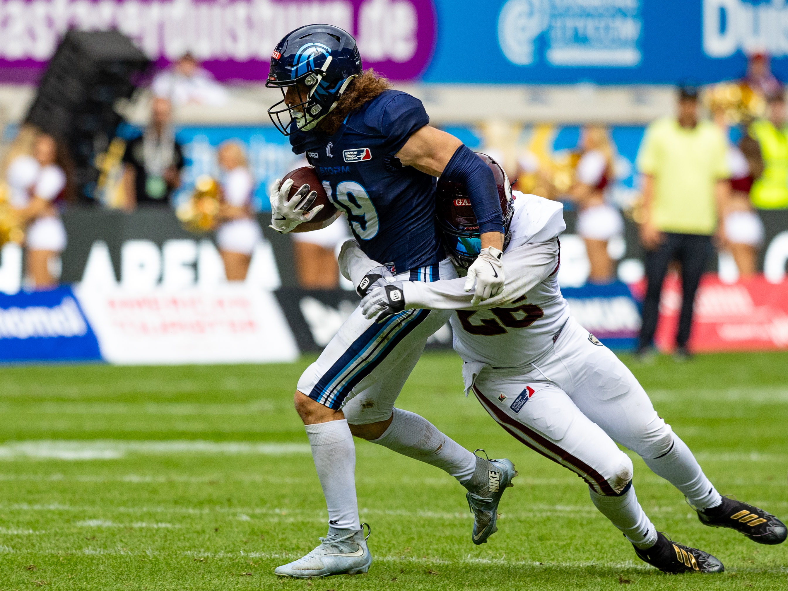 #26 Lino Schroeter (Schröter) (LB) Rhein Fire tackle #19 Brendan Beaulieu (WR) Nordic Storm Rhein Fire vs Nordic Storm, American Football, European League of Football, Week 14, 2025, 17.08.2025,