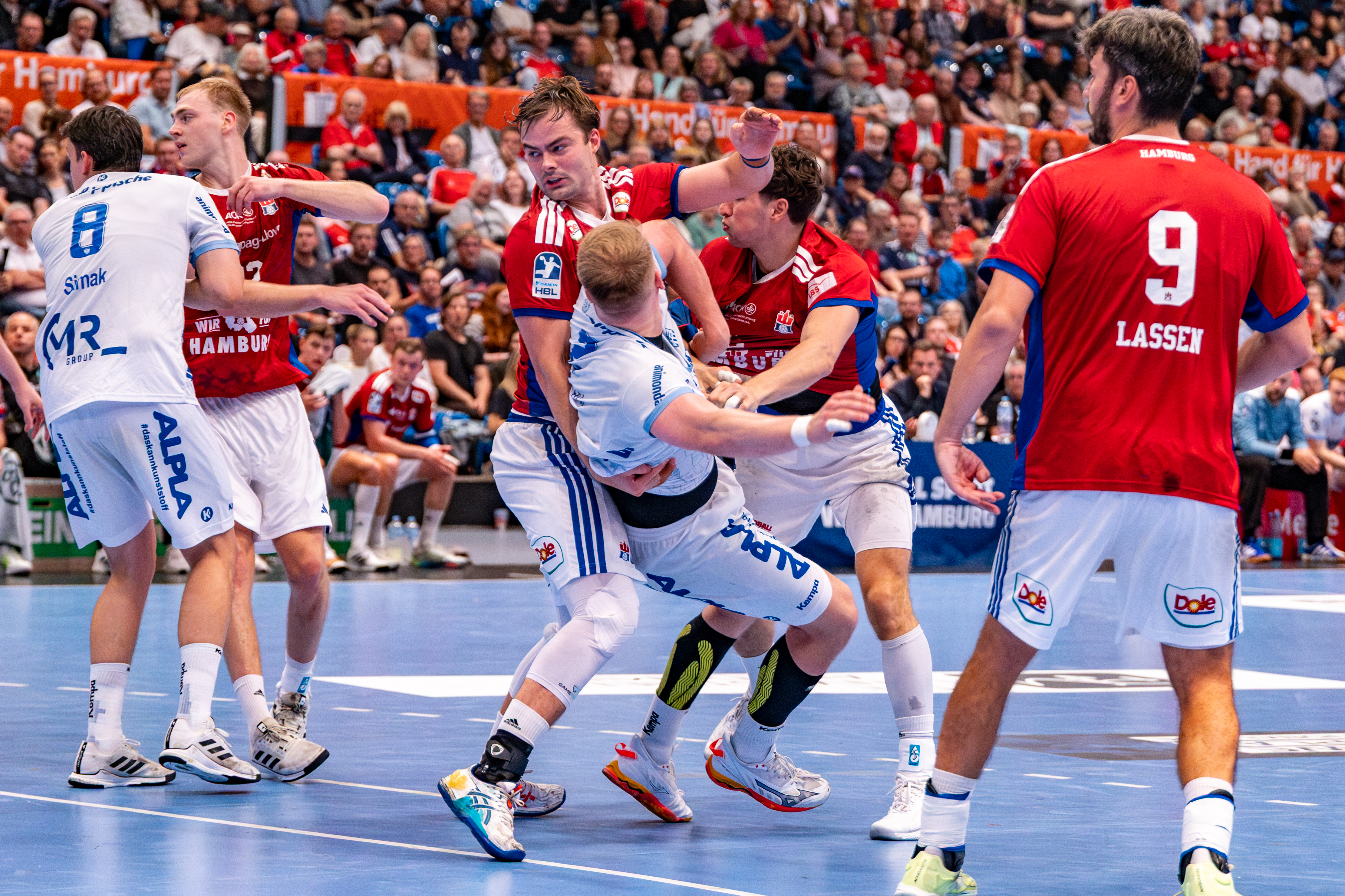 #8 Frederik Simak (Linksaußen) – TBV Lemgo Lippe, #2 Lukas Hutecek (Rückraum links) – TBV Lemgo Lippe and #9 Jacob Lassen (Rückraum rechts) – Handball Sport Verein Hamburg, #4 Andreas Magaard (Kreisläufer) – Handball Sport Verein Hamburg
